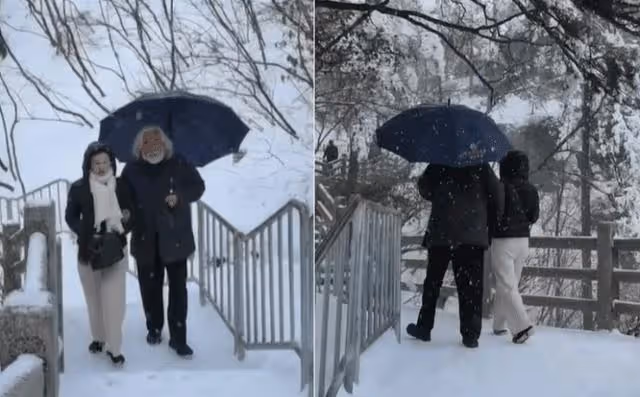 70歲張紀中分享近況,與小31歲妻子雪中賞景,為妻子撐傘太有愛