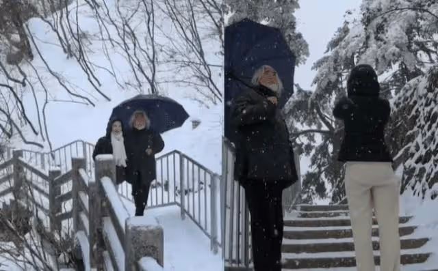 70歲張紀中分享近況,與小31歲妻子雪中賞景,為妻子撐傘太有愛