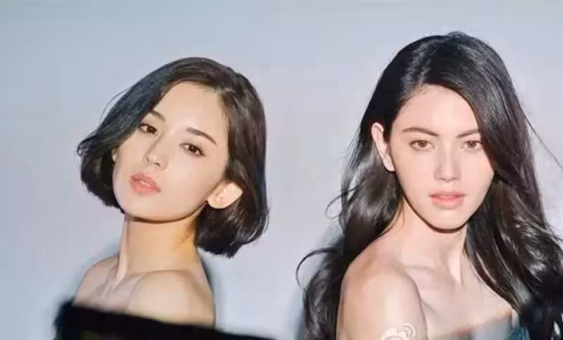 Mai曬和娜紮熱巴合影，熱巴額頭跟臉一樣大，娜紮五官是真的立體