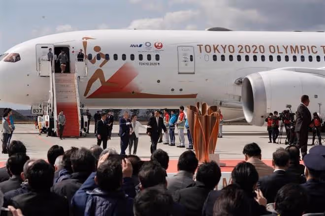 石原里美亮眼造型接東奧聖火，不戴口罩以堅定奧運信心