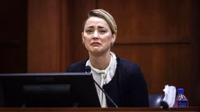 Amber Heard嗆「有罪才不敢看我」　Johnny Depp苦笑：就不想看啊！