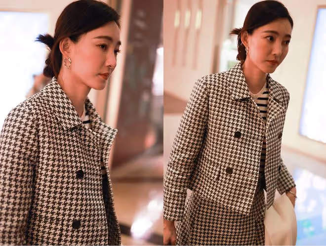 王麗坤的身材真好,白色背心配H版外套優雅知性,好有女人味