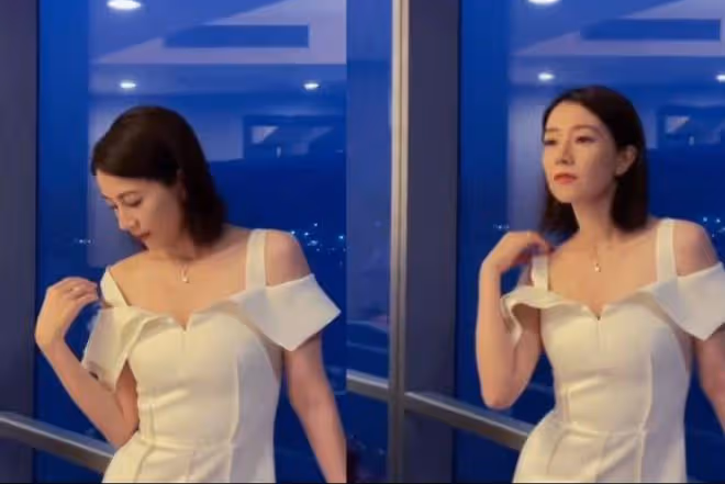 高圓圓穿露肩裙秀身材，活動中肩帶滑落太危險，高圓圓火速扶起