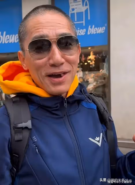 劉嘉玲夫婦國外度假,61歲梁朝偉街頭吃冰淇淋,留短寸像小老頭
