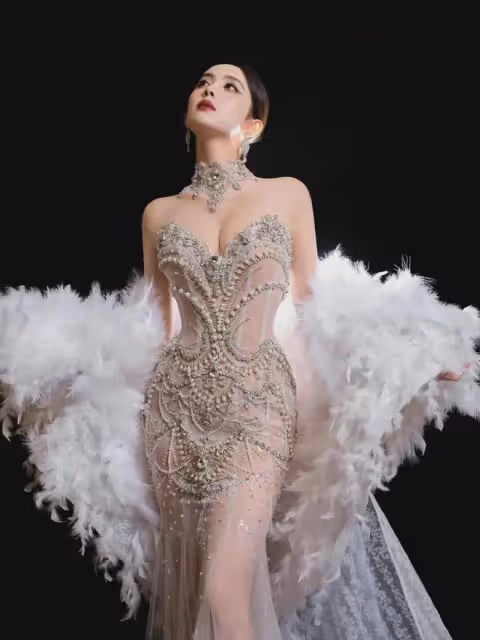 古力娜扎的珍珠羽毛仙女裙,展現絕美氣質