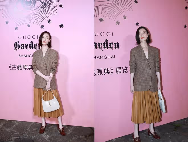 倪妮真是濃顏系大美女，化濃妝配綠裙好顯白，肌膚"反光"太迷人