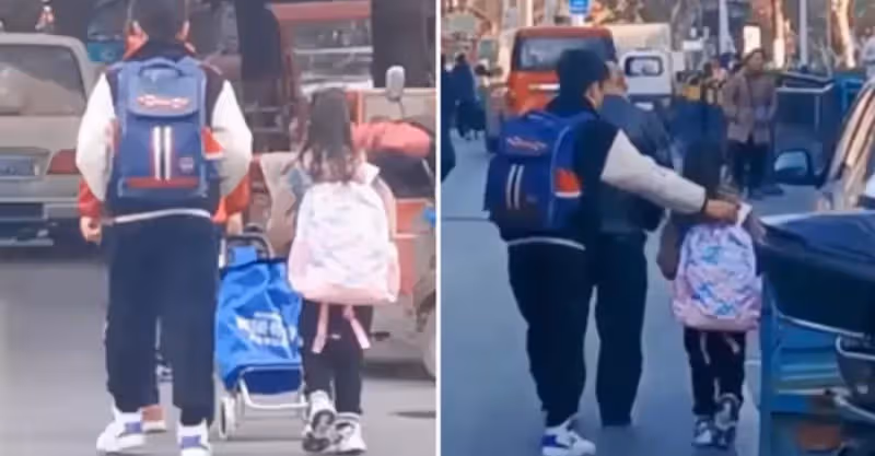 媽媽有事外出，小女孩獨自上學，不放心追上去查看，發現高年級小哥哥「一路護送」網贊：家教太好了