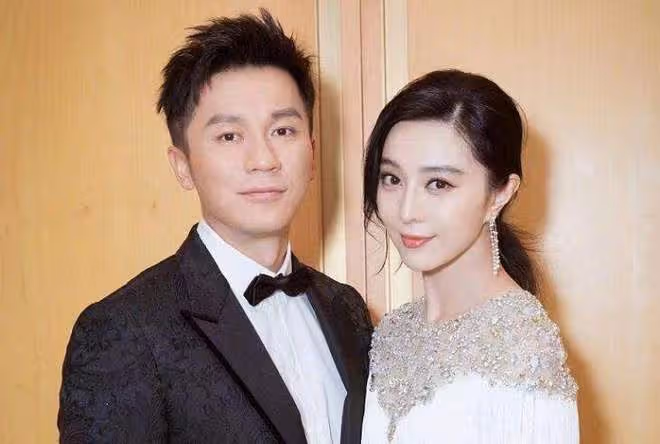 40歲范冰冰現身杭州街頭,穿弔帶裙大方露美背,手臂粗壯反差明顯