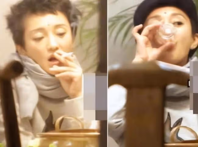 47歲周迅飯桌上抽雪茄 大口抽菸十分老練