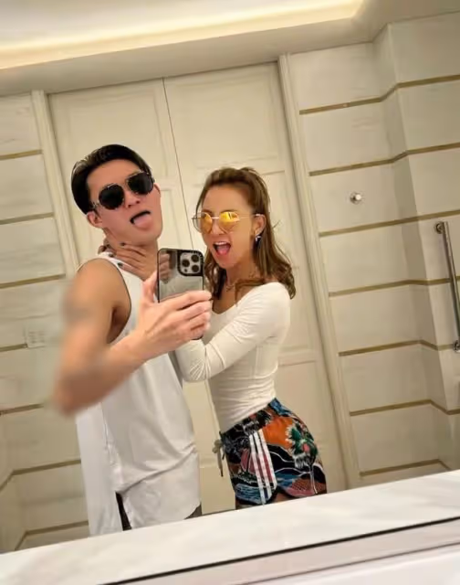 李玟與年輕型男親密摟抱,穿掛脖弔帶親吻身材火辣,不見富豪老公