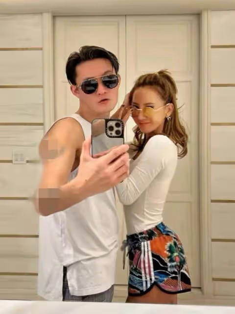 李玟與年輕型男親密摟抱,穿掛脖弔帶親吻身材火辣,不見富豪老公