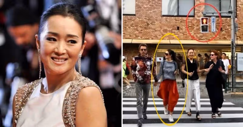 鞏俐夫婦赴日本被拍，穿「大紅燈籠褲」休閑又時髦，被老公牽著闖紅燈