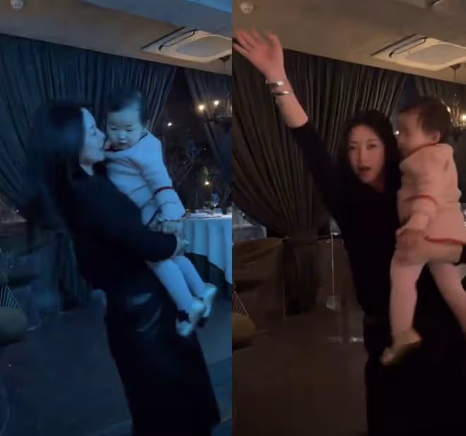 朱珠抱1歲女兒在餐廳跳舞,手舞足蹈興致高,身姿曼妙風情萬種