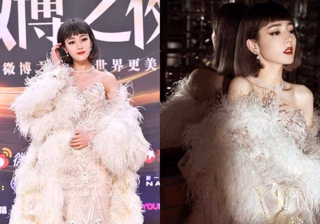 迪麗熱巴身穿雞毛裙，搭配短髮新造型，比瑪麗蓮夢露都時尚