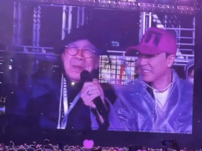 周杰倫香港演唱會尾場遭遇大雨,91歲胡楓冒雨觀看,甄子丹攜眷捧場