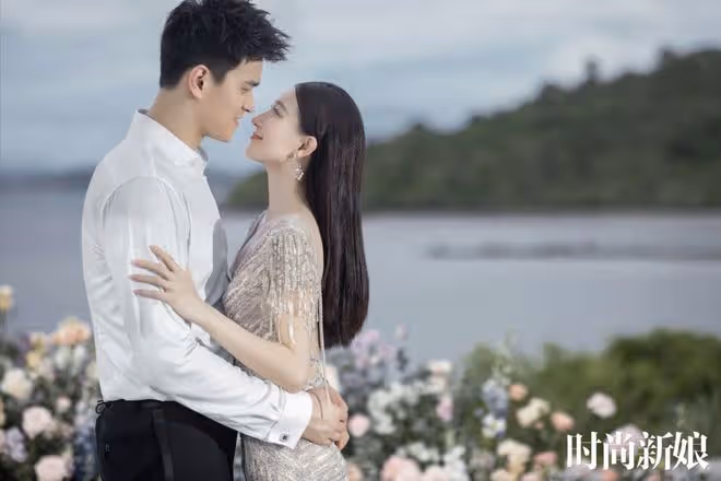 孫楊曬婚紗照秀幸福!張豆豆鎖骨直角肩吸睛,夫妻倆海邊甜蜜相擁