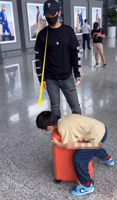 Angelababy戴18萬項鍊,機場懶理6歲兒子,剛和190cm弟弟日本旅遊