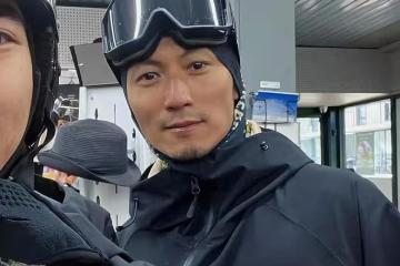 謝霆鋒墨爾本滑雪畫面:蹲在雪地上教兒子Lucas,合影時摘掉面罩