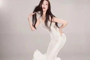 張馨予穿白裙拍大片,形象變化太大引起熱議,網友:以為是宋軼