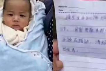 6個月男嬰被拋 棄路邊不 哭不鬧，父母卻留 下了一張紙條