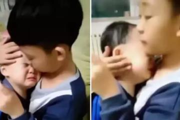 3歲弟弟被爸爸教訓，委屈鉆進7歲哥哥懷里告狀「爸爸又訓我」，哥哥暖舉感動大批網友：看完想生二胎了