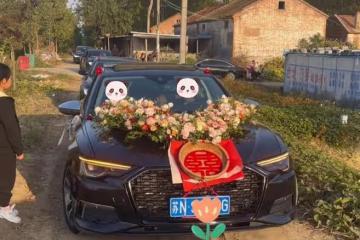 接親隊伍與私家車狹路相逢，私家車拒不讓路，婚車只好集體倒車